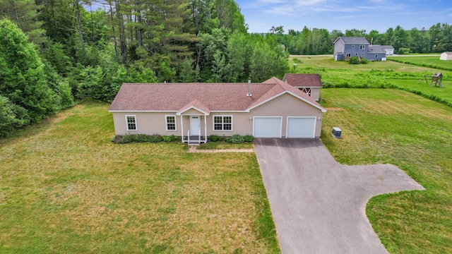 31 Silas Warren Dr, Hermon, ME 04401 - ranch-style home with asphalt driveway, a garage, and a front lawn