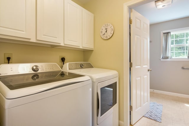 31 Silas Warren Dr, Hermon, ME 04401 - laundry room featuring washing machine and dryer, cabinet space, and light tile patterned flooring