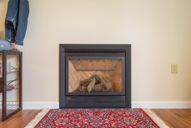 31 Silas Warren Dr, Hermon, ME 04401 - detailed view of baseboards and wood finished floors