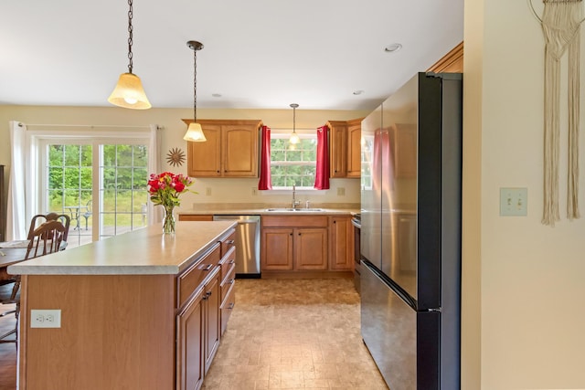 31 Silas Warren Dr, Hermon, ME 04401 - kitchen featuring stainless steel appliances, light countertops, healthy amount of natural light, pendant lighting, and recessed lighting