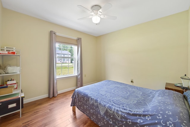 31 Silas Warren Dr, Hermon, ME 04401 - bedroom with wood finished floors and a ceiling fan