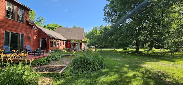 987 Clinton Ave, Winslow, ME 04901 - view of green lawn with a vegetable garden