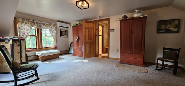 987 Clinton Ave, Winslow, ME 04901 - living area featuring light colored carpet, a baseboard radiator, and a wall mounted AC