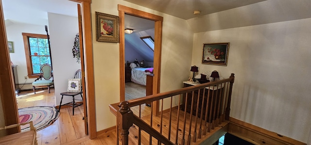 987 Clinton Ave, Winslow, ME 04901 - hall featuring light wood-style floors and an upstairs landing
