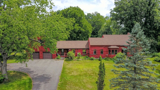 987 Clinton Ave, Winslow, ME 04901 - view of front of home with driveway, a front yard, and roof with shingles