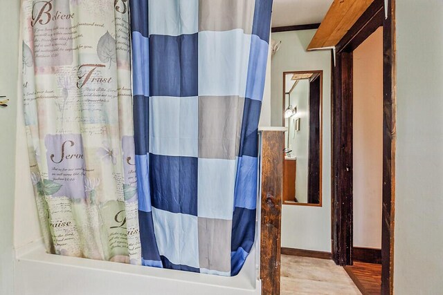 71 Morgan Rd, Burnham, ME 04922 - full bath featuring wood finished floors and shower / bathtub combination with curtain