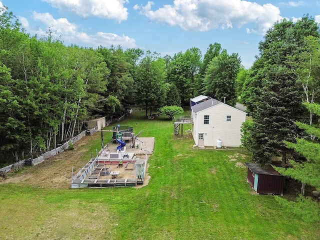 71 Morgan Rd, Burnham, ME 04922 - view of yard featuring a shed and a forest view