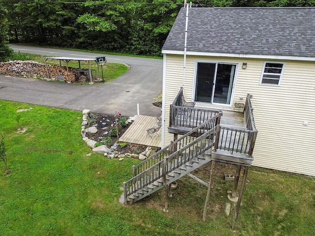 71 Morgan Rd, Burnham, ME 04922 - wooden deck featuring stairs and a lawn