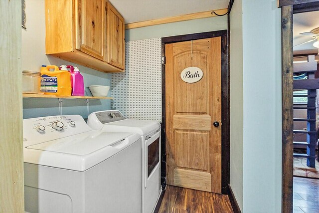 71 Morgan Rd, Burnham, ME 04922 - laundry room featuring independent washer and dryer, cabinet space, and dark wood-type flooring