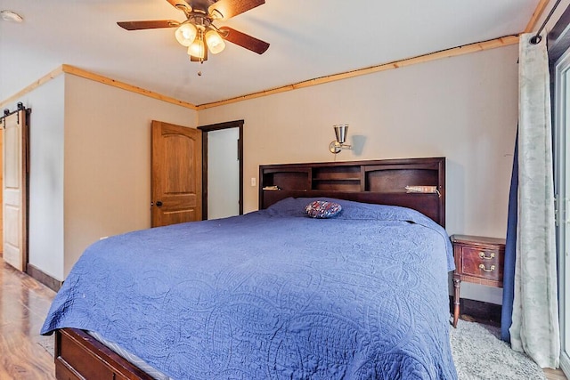 71 Morgan Rd, Burnham, ME 04922 - bedroom featuring wood finished floors, a ceiling fan, and ornamental molding