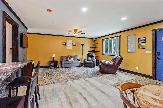 71 Morgan Rd, Burnham, ME 04922 - living room with ceiling fan, wood finished floors, ornamental molding, and recessed lighting