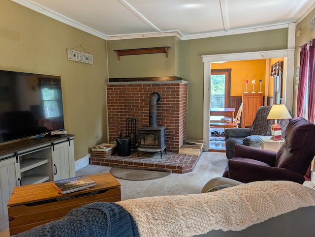 419 Common Rd, Union, ME 04862 - carpeted living room featuring a wood stove and ornamental molding