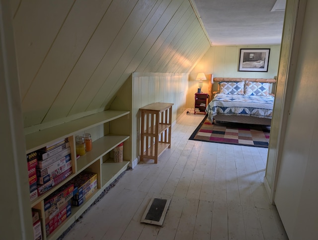 419 Common Rd, Union, ME 04862 - bedroom with lofted ceiling and hardwood / wood-style floors