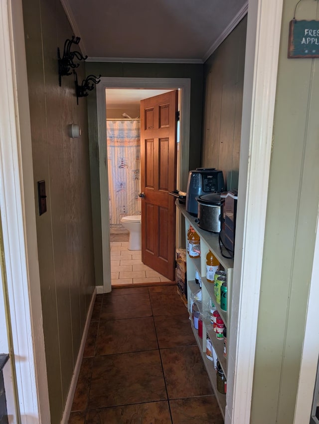 419 Common Rd, Union, ME 04862 - corridor with crown molding, tile patterned flooring, and wood walls