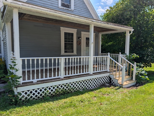 419 Common Rd, Union, ME 04862 - view of front facade with a porch and a front yard