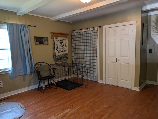 419 Common Rd, Union, ME 04862 - living area featuring beam ceiling, wood finished floors, and healthy amount of natural light