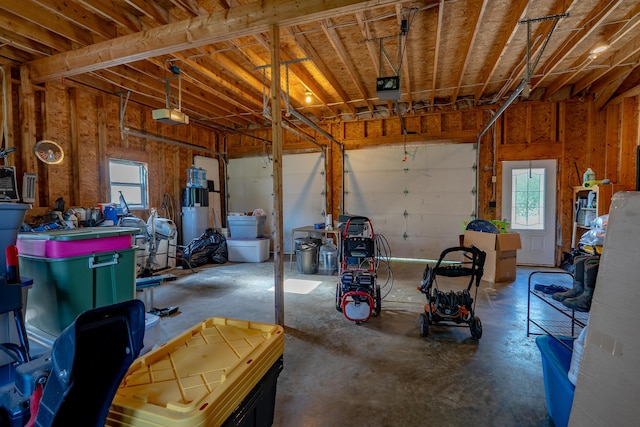 78 Lakeview Rd, Glenburn, ME 04401 - garage featuring a garage door opener