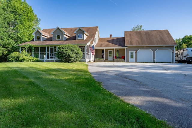 78 Lakeview Rd, Glenburn, ME 04401 - cape cod home featuring asphalt driveway, an attached garage, and a front yard
