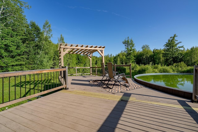 78 Lakeview Rd, Glenburn, ME 04401 - wooden deck with a pergola