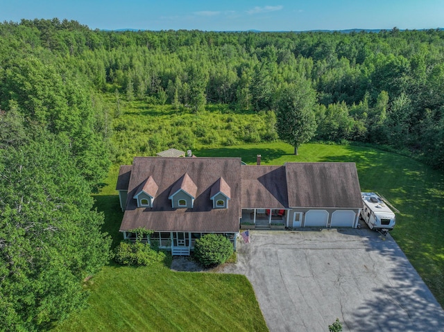 78 Lakeview Rd, Glenburn, ME 04401 - aerial view of property and surrounding area featuring a heavily wooded area