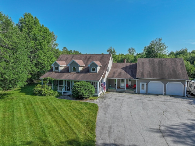 78 Lakeview Rd, Glenburn, ME 04401 - cape cod-style house with covered porch, asphalt driveway, an attached garage, and a front lawn