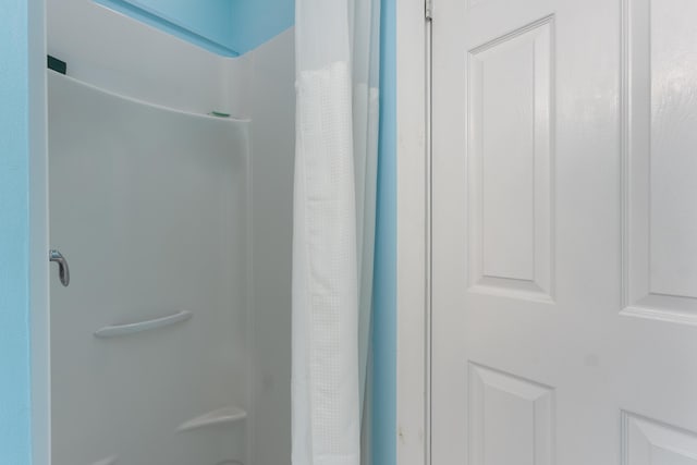 36 Ocean House Way Unit E4, York, ME 03909 - bathroom featuring a shower with shower curtain