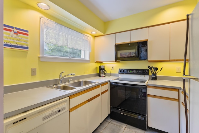 36 Ocean House Way Unit E4, York, ME 03909 - kitchen featuring black appliances, light countertops, light tile patterned flooring, white cabinets, and recessed lighting