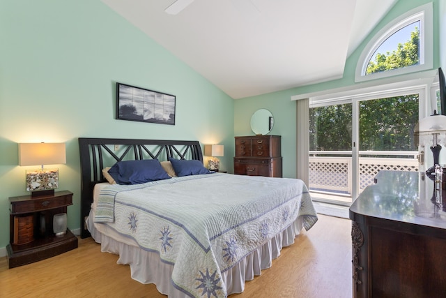36 Ocean House Way Unit E4, York, ME 03909 - bedroom with wood finished floors, high vaulted ceiling, and access to exterior