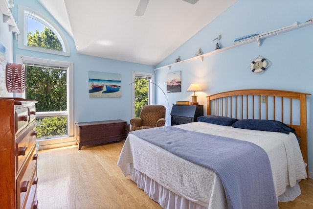 36 Ocean House Way Unit E4, York, ME 03909 - bedroom with light wood-style floors, a ceiling fan, and high vaulted ceiling