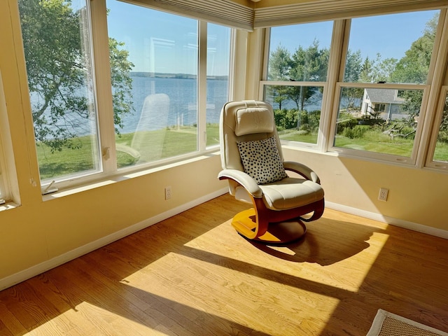 48 Sheltons Rd, Trenton, ME 04605 - sunroom / solarium featuring a water view and wood finished floors