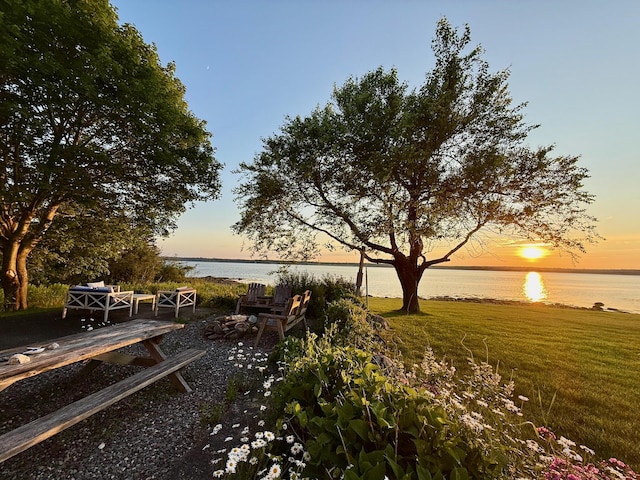 48 Sheltons Rd, Trenton, ME 04605 - yard at dusk with a water view