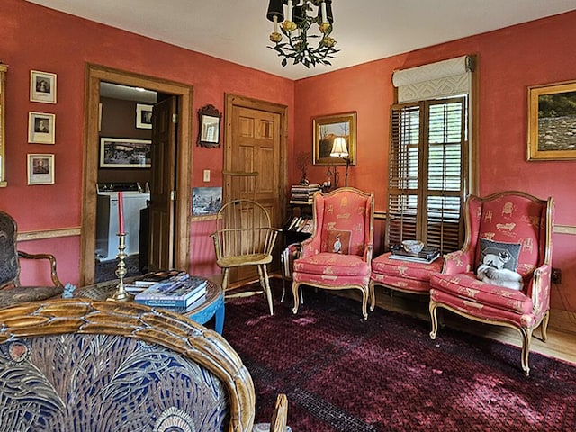 8 Longfellow School Rd, Bristol, ME 04539 - sitting room with washer and dryer, a chandelier, and carpet flooring