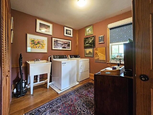 8 Longfellow School Rd, Bristol, ME 04539 - laundry room featuring separate washer and dryer and wood finished floors