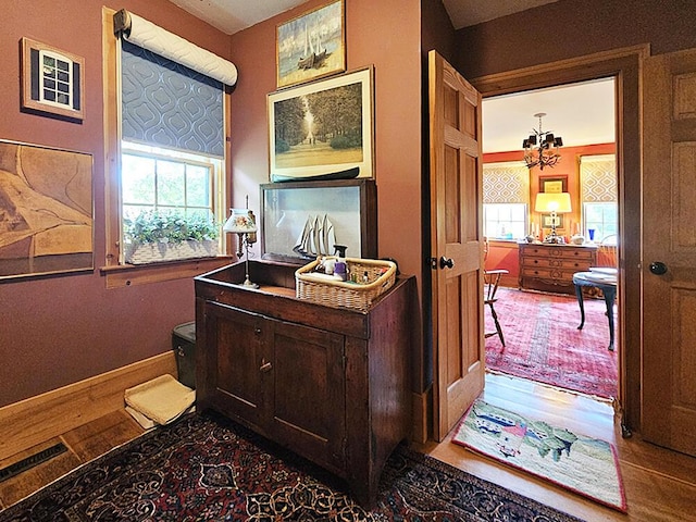 8 Longfellow School Rd, Bristol, ME 04539 - office area with wood finished floors and a chandelier