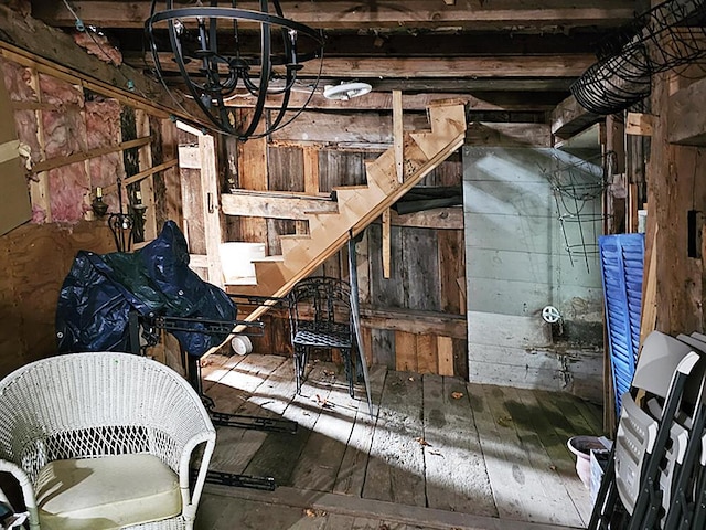 8 Longfellow School Rd, Bristol, ME 04539 - basement featuring a chandelier and stairs
