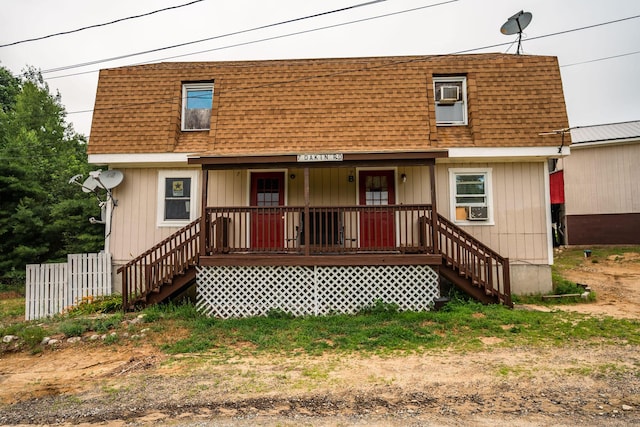 7 Dakin Rd, Turner, ME 04282 - back of house with a shingled roof, a porch, mansard roof, and stairs