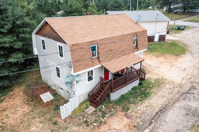 7 Dakin Rd, Turner, ME 04282 - view of front of house with a shingled roof, crawl space, and stairway