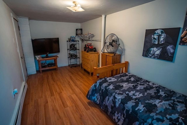 7 Dakin Rd, Turner, ME 04282 - bedroom featuring baseboard heating and wood finished floors