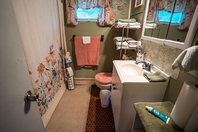 7 Dakin Rd, Turner, ME 04282 - bathroom featuring vanity, baseboard heating, and a shower with shower curtain
