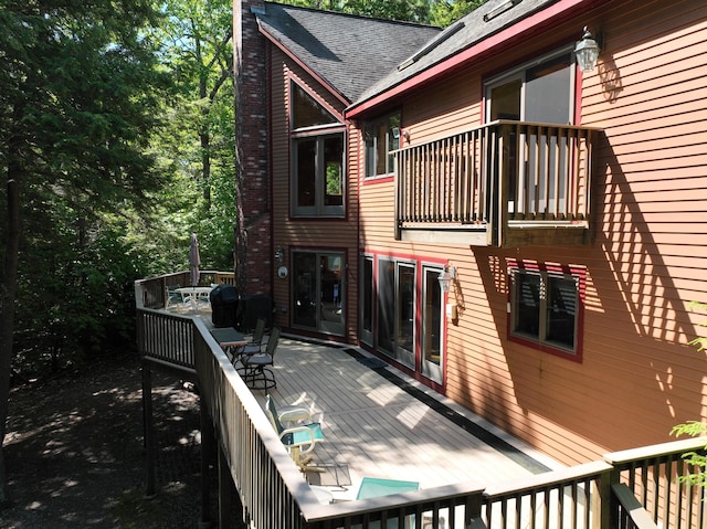 42 Knowles Point Rd, Bridgton, ME 04009 - wooden terrace with outdoor dining area