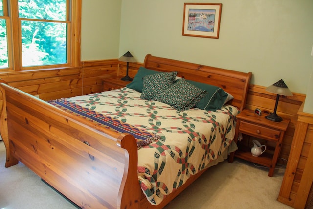 42 Knowles Point Rd, Bridgton, ME 04009 - carpeted bedroom with wooden walls and wainscoting