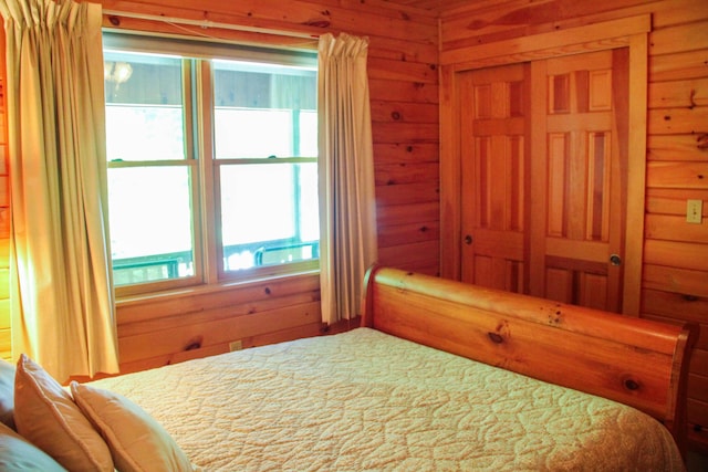 42 Knowles Point Rd, Bridgton, ME 04009 - bedroom featuring wood walls