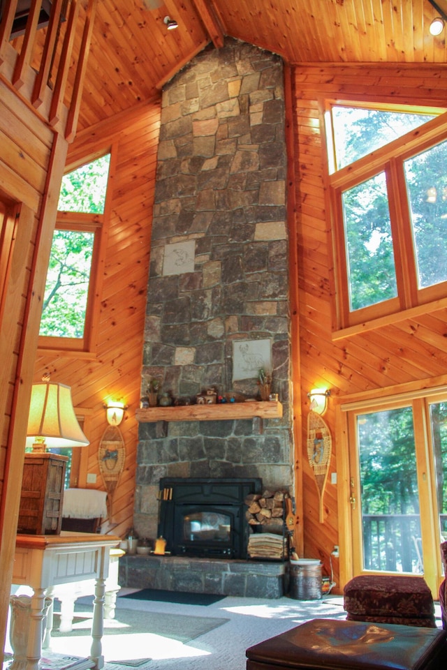 42 Knowles Point Rd, Bridgton, ME 04009 - living room featuring wood walls, high vaulted ceiling, and a wood ceiling with exposed beams