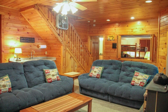 42 Knowles Point Rd, Bridgton, ME 04009 - living room featuring stairs, wood ceiling, wooden walls, recessed lighting, and carpet