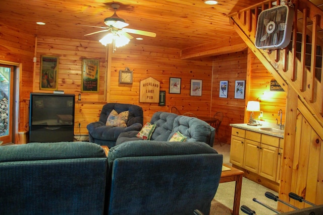 42 Knowles Point Rd, Bridgton, ME 04009 - living area with ceiling fan, wood ceiling, light colored carpet, wooden walls, and recessed lighting