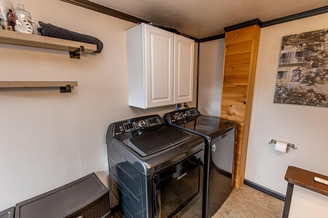 143 Mayfield Rd, Moscow, ME 04920 - washroom with washing machine and clothes dryer and cabinet space