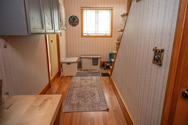 143 Mayfield Rd, Moscow, ME 04920 - bathroom with wood finished floors and wallpapered walls