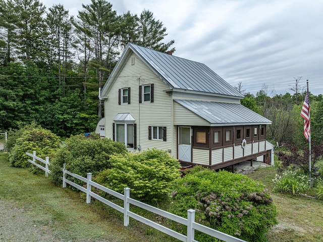 143 Mayfield Rd, Moscow, ME 04920 - view of front facade with a metal roof