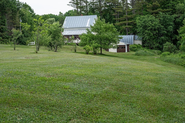 143 Mayfield Rd, Moscow, ME 04920 - view of grassy yard with an outbuilding