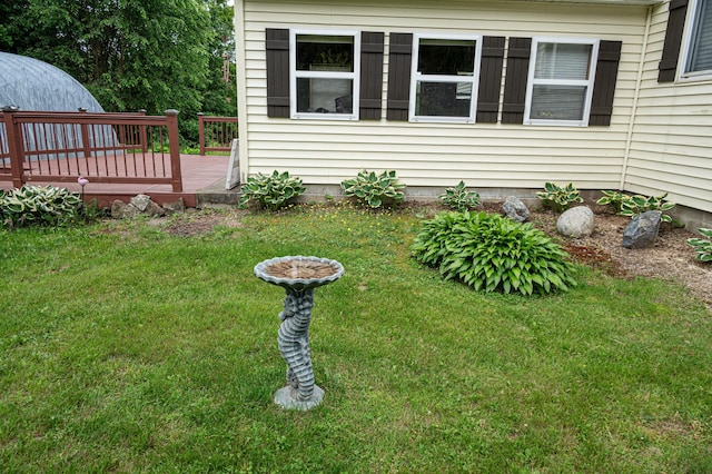 143 Mayfield Rd, Moscow, ME 04920 - view of grassy yard featuring a deck